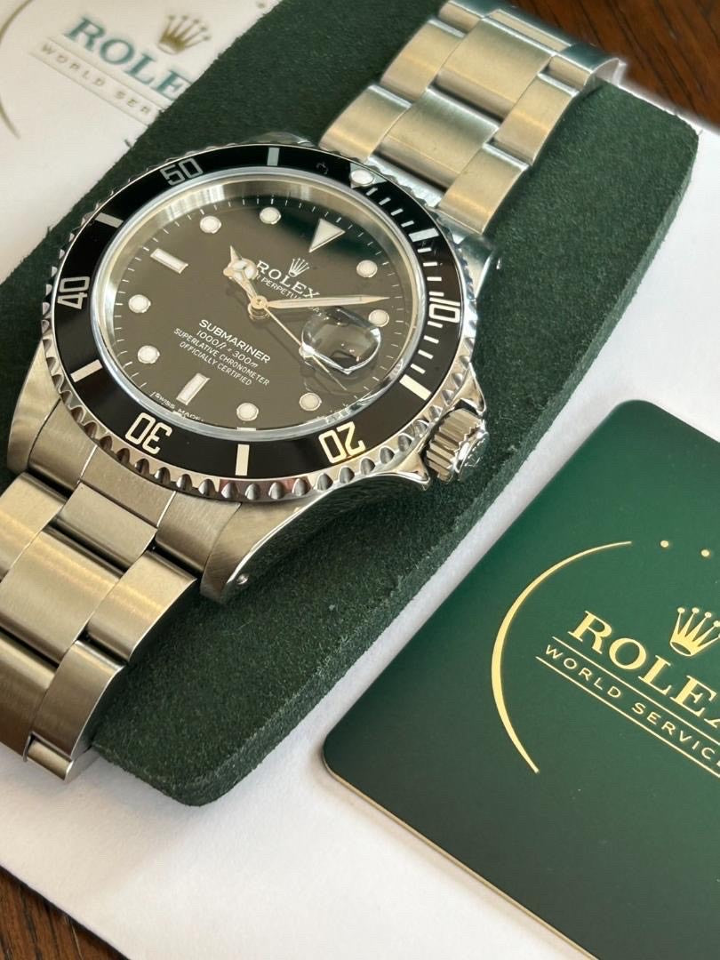 Rolex Submariner Date - Black Dial, Oystersteel, Full Set with Authenticity Materials