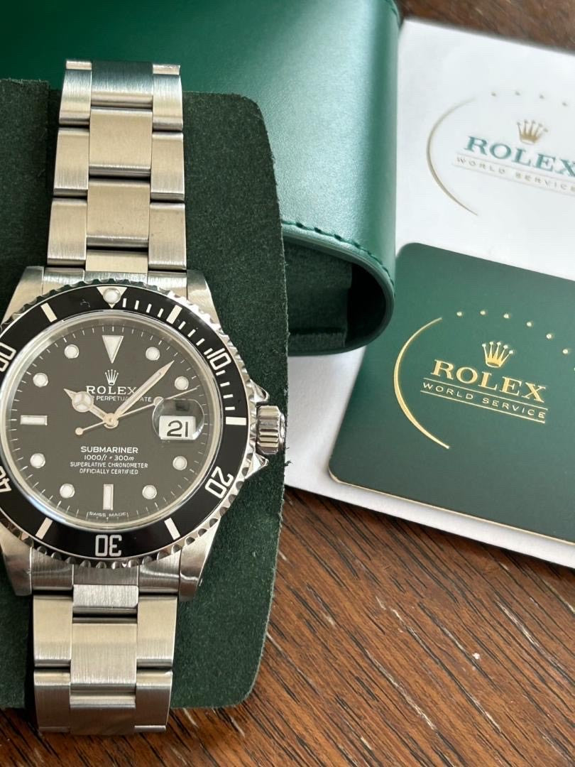 Rolex Submariner Date - Black Dial, Oystersteel, Full Set with Authenticity Materials