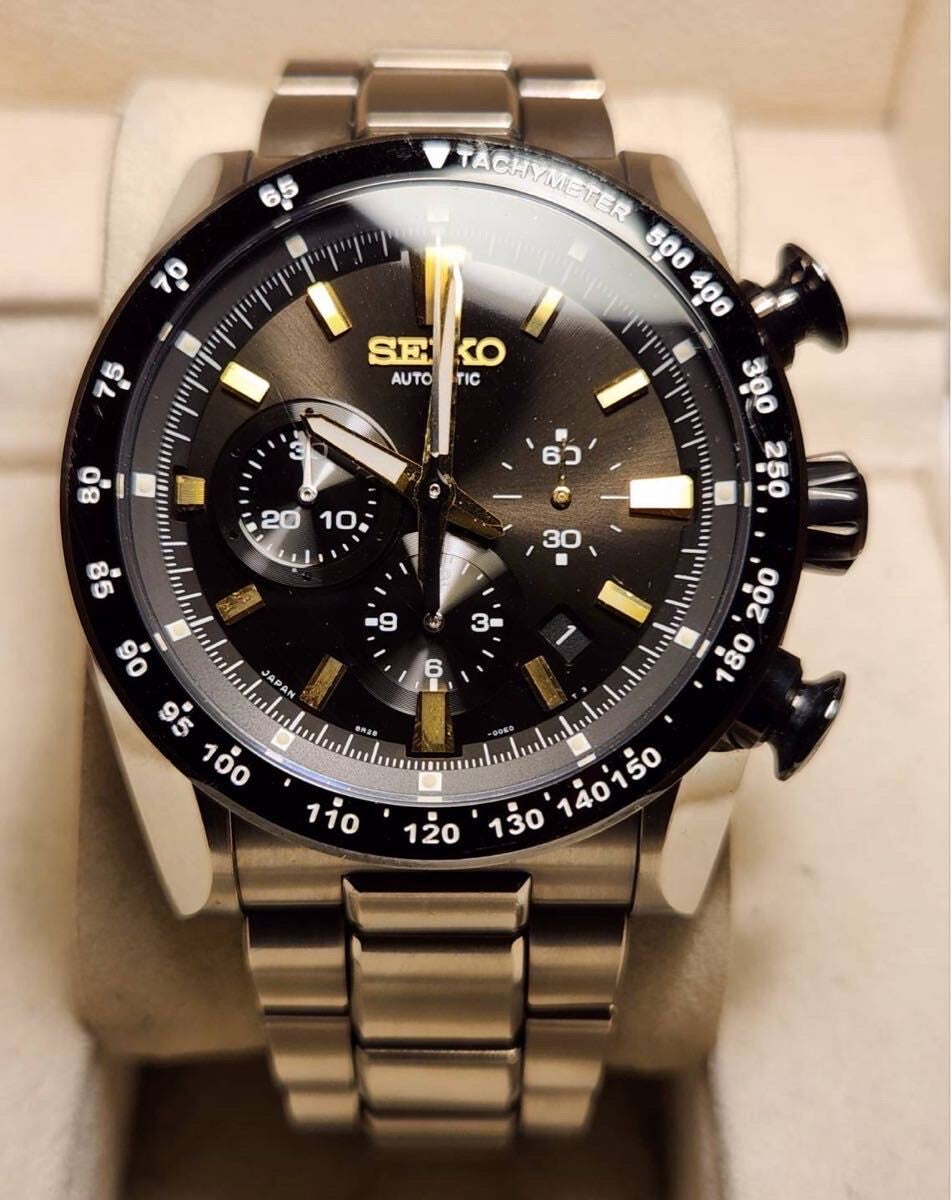 Seiko Automatic Chronograph - Black Dial with Gold Accents, Stainless Steel Bracelet